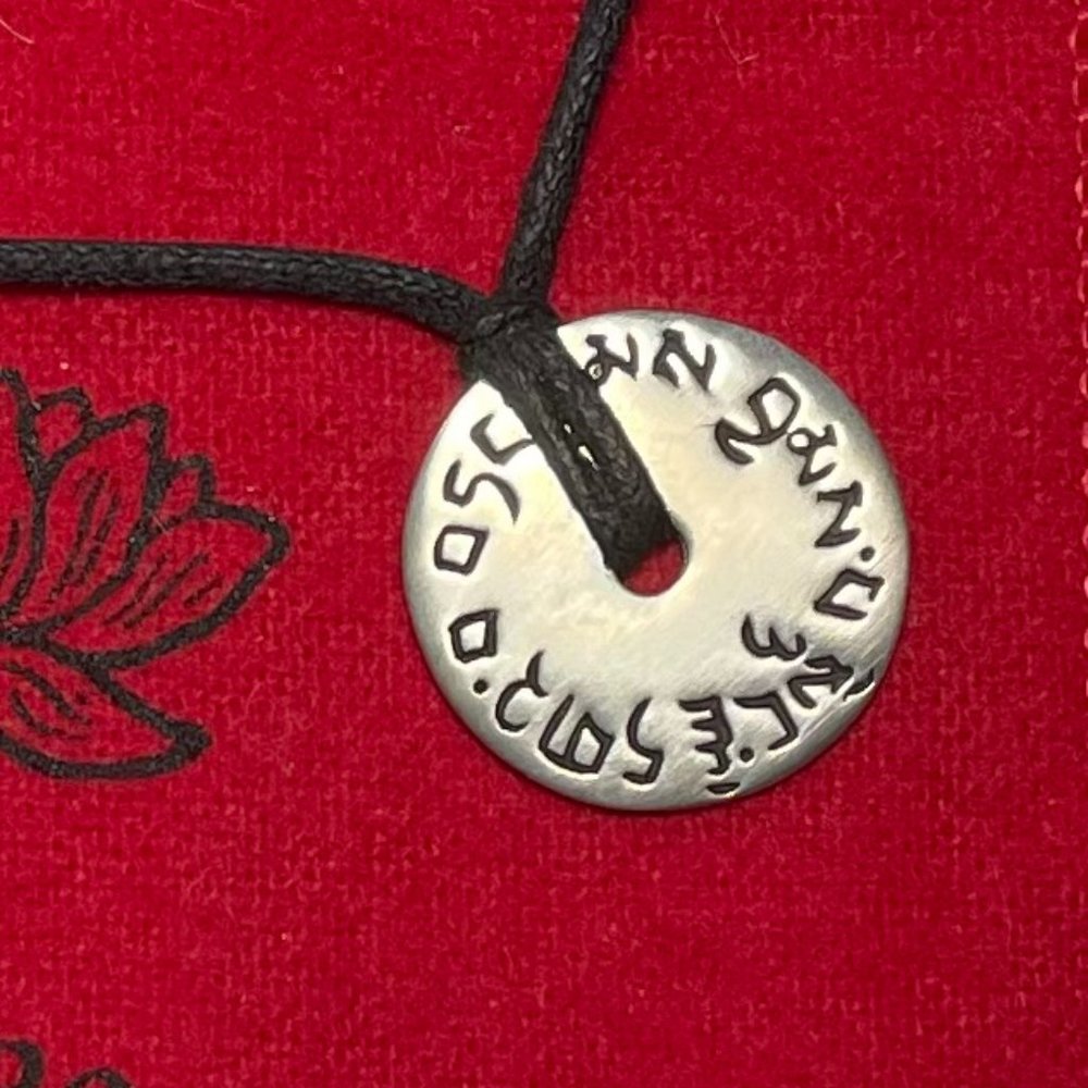 Me&Ro Sanskrit (Love, Compassion, Joy, Humanity) corded pendant